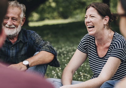 Friends laughing outside picnic Friends laughing outside picnic